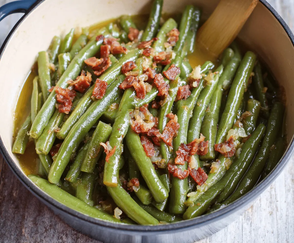 Delicious Southern Style Green Beans cooked with smoky bacon and seasonings, served as a flavorful side dish