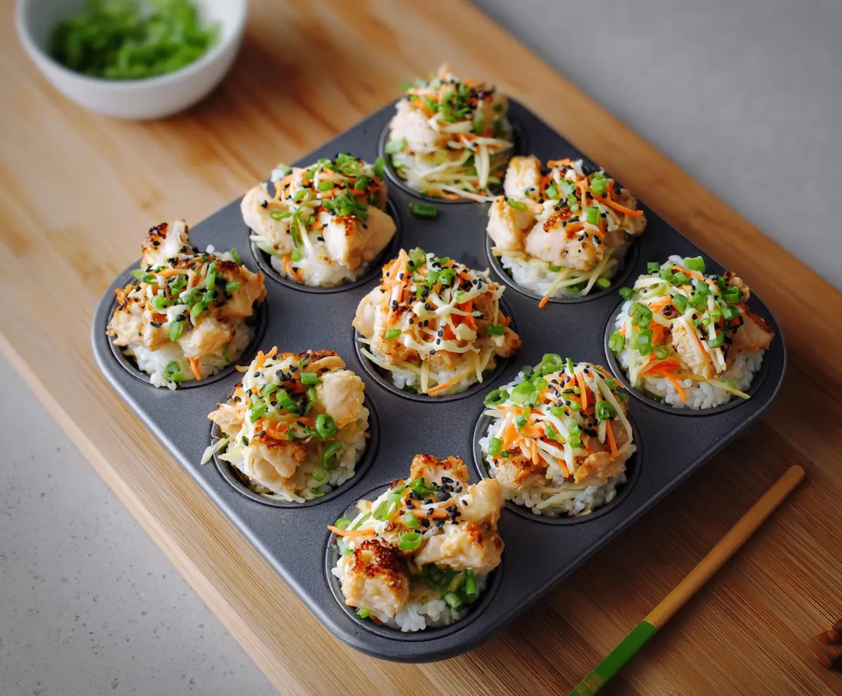 Delicious chicken sushi cups with fresh ingredients and vibrant presentation