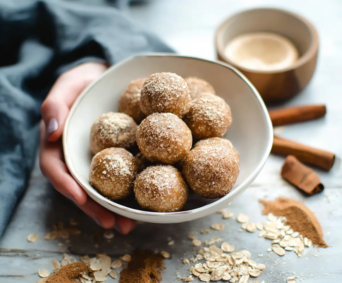 Delicious Cinnamon Roll Energy Bites featuring a golden-brown exterior and cinnamon swirl filling.