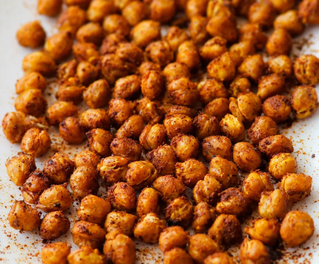 Crispy roasted chickpeas seasoned with herbs and spices for a healthy snack.