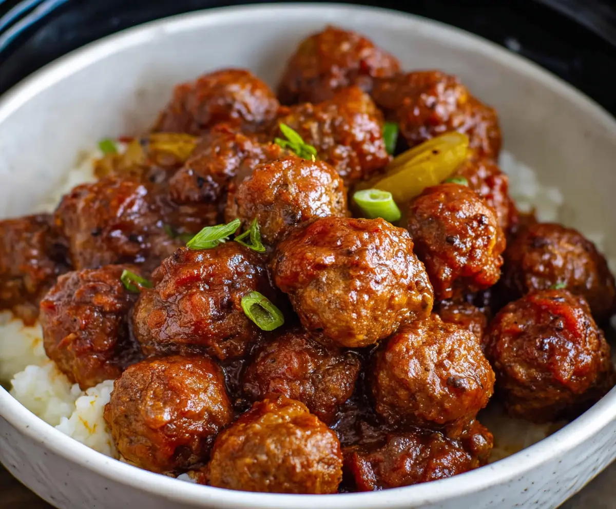Delicious Crockpot Mississippi Meatballs with savory sauce and fresh herbs