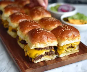 Delicious cheeseburger sliders made with soft Hawaiian rolls and melted cheese.