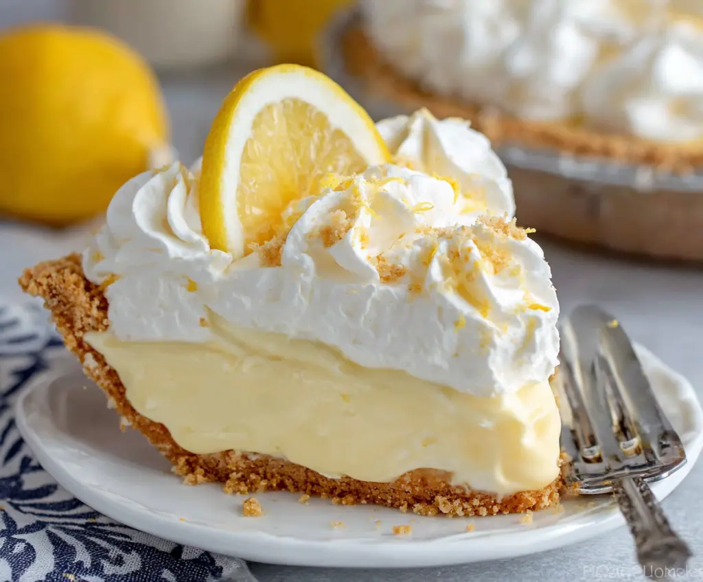 Delicious homemade lemon cream pie with a golden crust and creamy lemon filling
